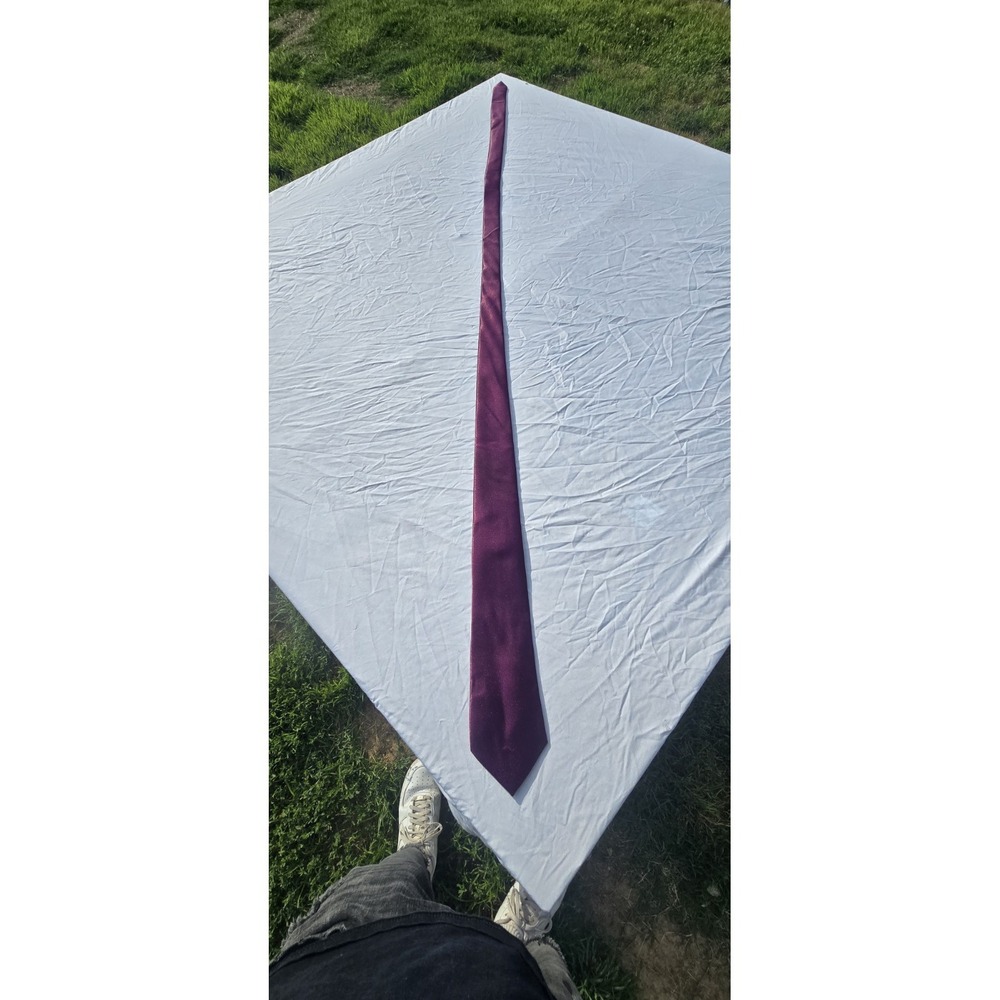 purple DiBanGu tie with a woven texture and branded label